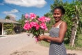 Dominican people. Dominican people Woman with flowers. Dominican Republic Hato Mayor province 04.02.2013