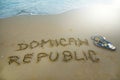 Dominican republic written in the sand. Exotic vacation concept. Royalty Free Stock Photo