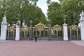 Dominion Gates in London, This gates exists of two stone columns topped with ornate figurative sculptures of a boy and the coat of Royalty Free Stock Photo