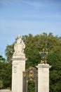 Dominion Gates in London, This gates exists of two stone columns topped with ornate figurative sculptures of a boy and the coat of