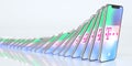 Many falling mobile phones with logo of DEUTSCHE TELEKOM on the displays, domino effect. Editorial 3d rendering, crisis