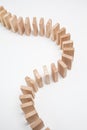 Domino effect - row of white dominoes Royalty Free Stock Photo