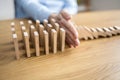 Domino Fall Prevention And Stop Royalty Free Stock Photo