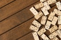 Domino. A game of dominoes on a wooden table Royalty Free Stock Photo
