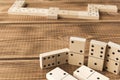 Domino. A game of dominoes on a wooden table Royalty Free Stock Photo