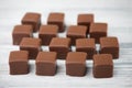 Domino stones, a german traditional christmas sweet with gingerbread, marzipan and jelly covered with brown chocolate, Dominostein