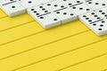 Domino tiles on yellow boards