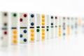 Dominoes. Dominos pieces with colorful dots in row Royalty Free Stock Photo