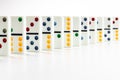 Dominoes. Dominos pieces with colorful dots in row Royalty Free Stock Photo
