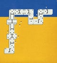 Dominoes with dots in the form of stylized men and women. Crowd. Staff. Against the background of the blue sky and the yellow Royalty Free Stock Photo