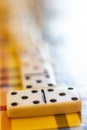 Dominoes on a table with plaid Royalty Free Stock Photo