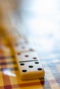 dominoes on a table with plaid Royalty Free Stock Photo