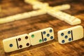 Dominoes tiles on vintage table Royalty Free Stock Photo