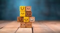 Dominoes on wooden background. Emoticon face on Wooden Cube.