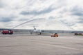 Domodedovo airport, Moscow - July 11th, 2015: Tupolev Tu-154M EW-85748 of Belavia Airlines greeted by water arch