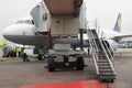 Domodedovo airport, Moscow - November 11th, 2010: Airbus A320-200 of Lufthansa with Jetbridge