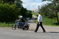 The inspector of road patrol service of police stopped for check of the motorcyclist