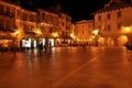 Domodossola, Italy. Lively Italian square at night.