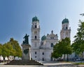 On the Domplatz square between the rivers Danube and Inn stands the cathedral of St. Stephen's with three towers with green