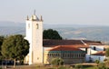 Domus Municipalis and white church, Braganca Royalty Free Stock Photo