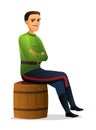 Don Cossack sits on barrel of wine. Cheerful young Russian guy. Male figure. Russia historical funny person character