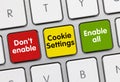 Don`t enable - Cookie Settings - Enable all - Inscription on multicolor Keyboard Key