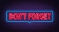 Don t Forget neon sign on brick wall background.