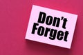 Don`t forget the word on a small piece of paper Royalty Free Stock Photo
