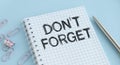 DON`T FORGET written text in small notebook Royalty Free Stock Photo