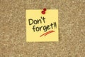 Don`t forget on yellow sticky note Royalty Free Stock Photo