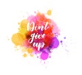 Don\'t give up - inspirational handwritten modern calligraphy lettering text on abstract watercolor paint splash background.