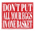 DON`T PUT ALL YOUR EGGS IN ONE BASKET, text on red stamp sign Royalty Free Stock Photo