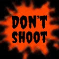 Don`t shoot sign on red and black background Royalty Free Stock Photo