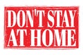 DON`T STAY AT HOME, words on red grungy stamp sign