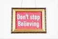 Don`t stop believing. Text label in the frame.