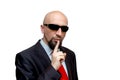 Don`t talk, keep quiet, tough bald man with dark glasses Royalty Free Stock Photo