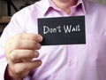 Don`t Wait  sign on the piece of paper Royalty Free Stock Photo