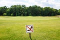 Don`t walk on the grass sign. Sign board on the park lawn Do not walk on the Grass. Royalty Free Stock Photo