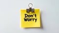 Don t Worry Note Reminder, Yellow Sticky Note Clipped on White Background, Optimism Concept Royalty Free Stock Photo
