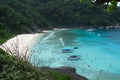 Donald Duck Bay on Similan Islands, aerial view. A lot of people and tourist boats in the blue clear waters of the bay