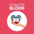 donate blood hand holding heart care