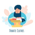 Donate clothes concept with a man carrying a box of clothes