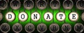 Donate Concept on Old Typewriter's Keys. Royalty Free Stock Photo