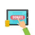 Donate money with computer tablet.