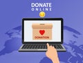 Donate online payments. Hand let money gold coin donation box on a laptop PC display Earth background. Charity