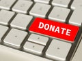 Donate on Red button of a keyboard Royalty Free Stock Photo
