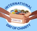 Donated canned food. Hands are passing cardboard box with humanitarian aid, grocery help to poor people and charity Royalty Free Stock Photo