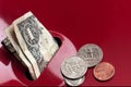 Donated money sits in salvation army collection Royalty Free Stock Photo