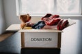 Donation box, Charity Gift hampers, Help Refugees and homeless. Christmas Xmas Charity Donation box with warm clothes Royalty Free Stock Photo