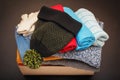 Donation box full of clothing on dark background. Closeup. View from above. Concept of charity and assistance